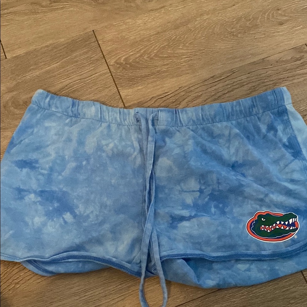Blue Athletic Shorts with Tie-Dye Pattern and Logo